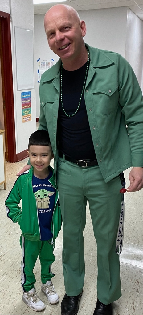 Man and boy in green suits